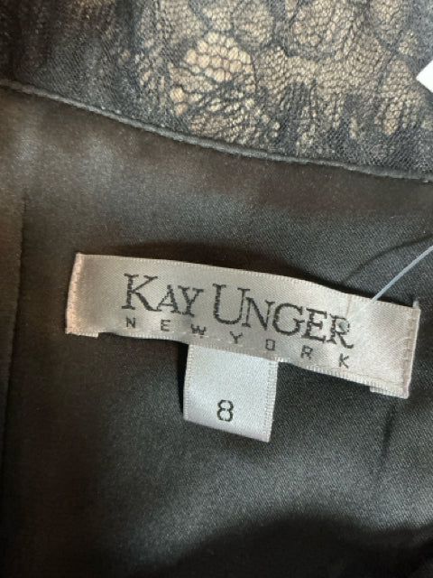 Brand label inside Kay Unger New York size 8 black floral brocade dress, highlighting designer authenticity and sizing information.
