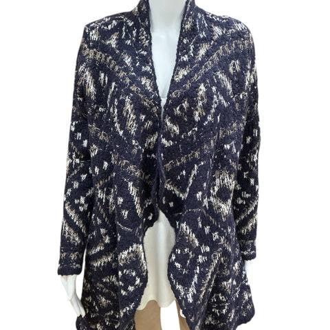 Lucky Shrug Size Small in navy/tan print displayed on mannequin, featuring open front and draped hem, sold at Margaret’s Fine Consignments.
