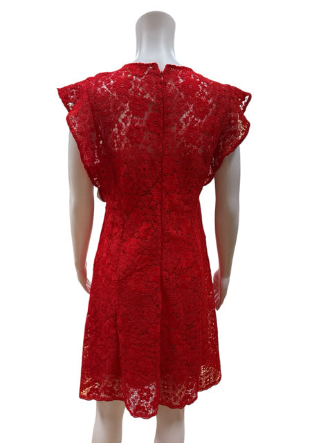 Back view of Michael Kors red lace pre-owned dress, showcasing zipper closure and elegant floral lace design in size medium.