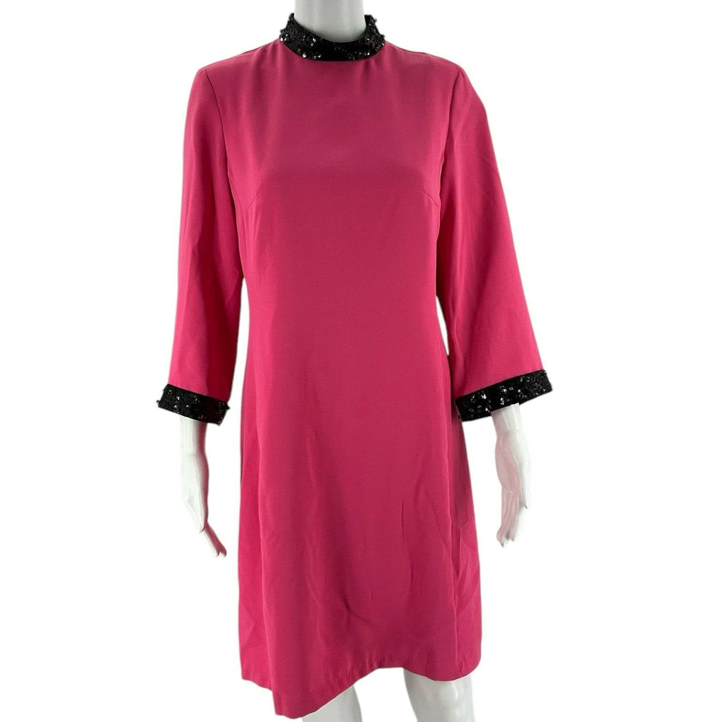 Front view of Julie Brown Size 4 pink dress with black sequin trim, available at Margaret's Fine Consignments. Elegant and brand new with tags.