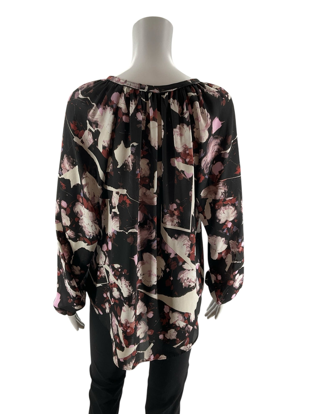Simply Vera black, white, and rust floral peasant tunic blouse in size medium with a relaxed fit and bohemian style.