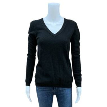 Loft black solid V-neck top size medium paired with skinny jeans on mannequin, cashmere fabric at Margaret's Fine Consignments.