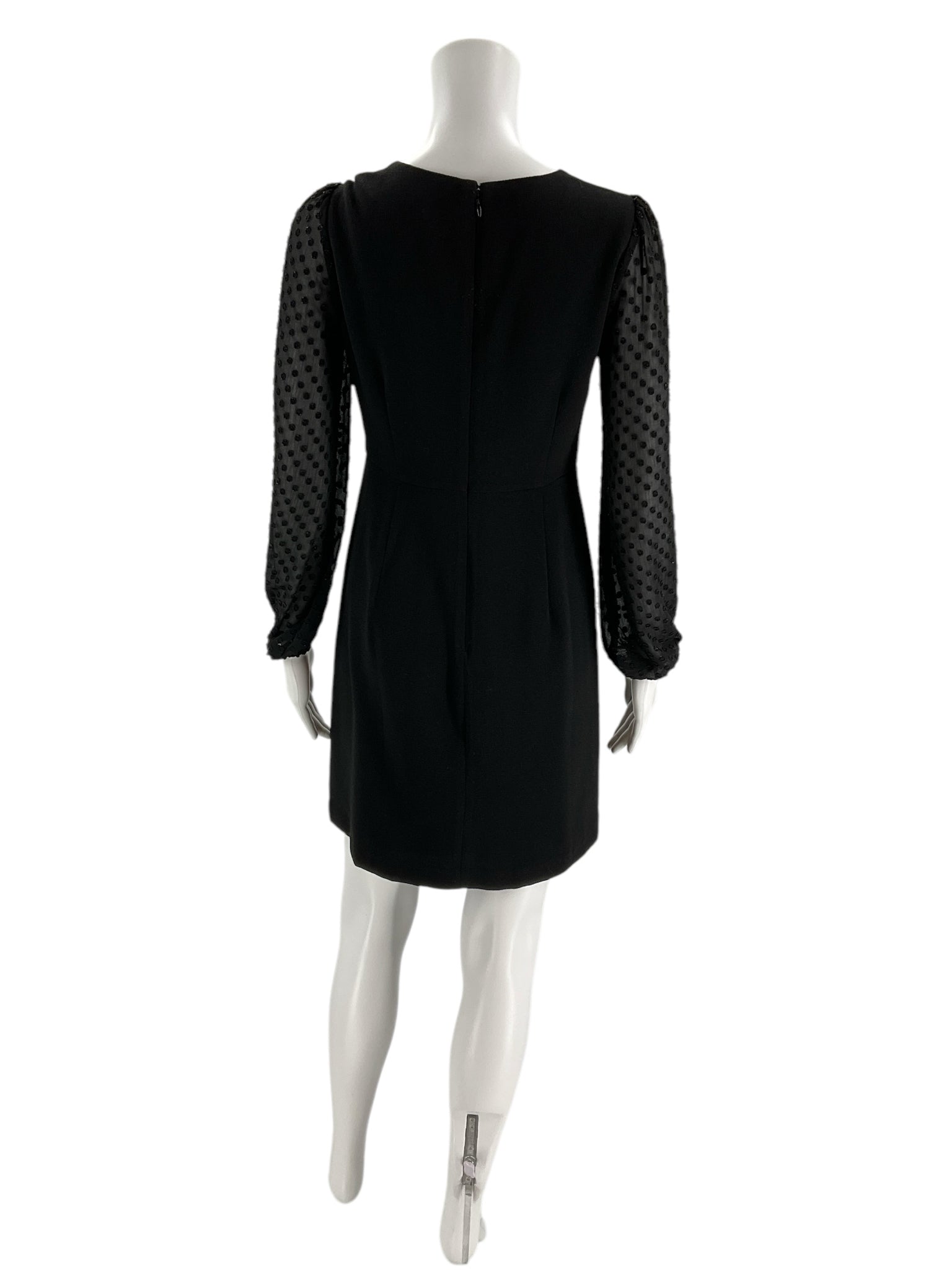 Back view of Ann Taylor Black Petite Dress with sheer dotted sleeves, gently used and elegant from Margaret's Fine Consignments.