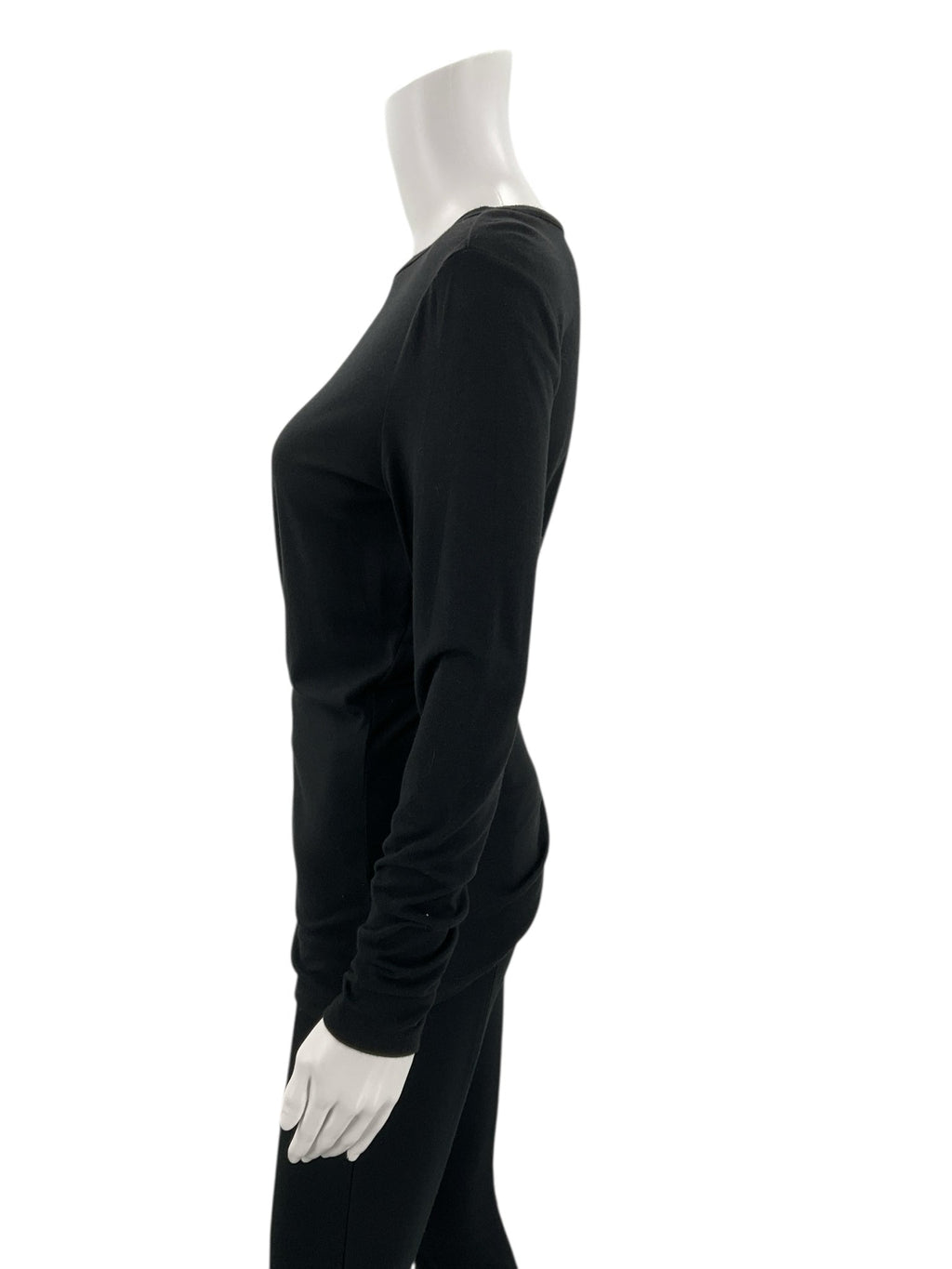 Side profile of Ann Taylor Black Solid Pre-Owned Top - Size Small on mannequin, showing fitted shape and clean seam lines.