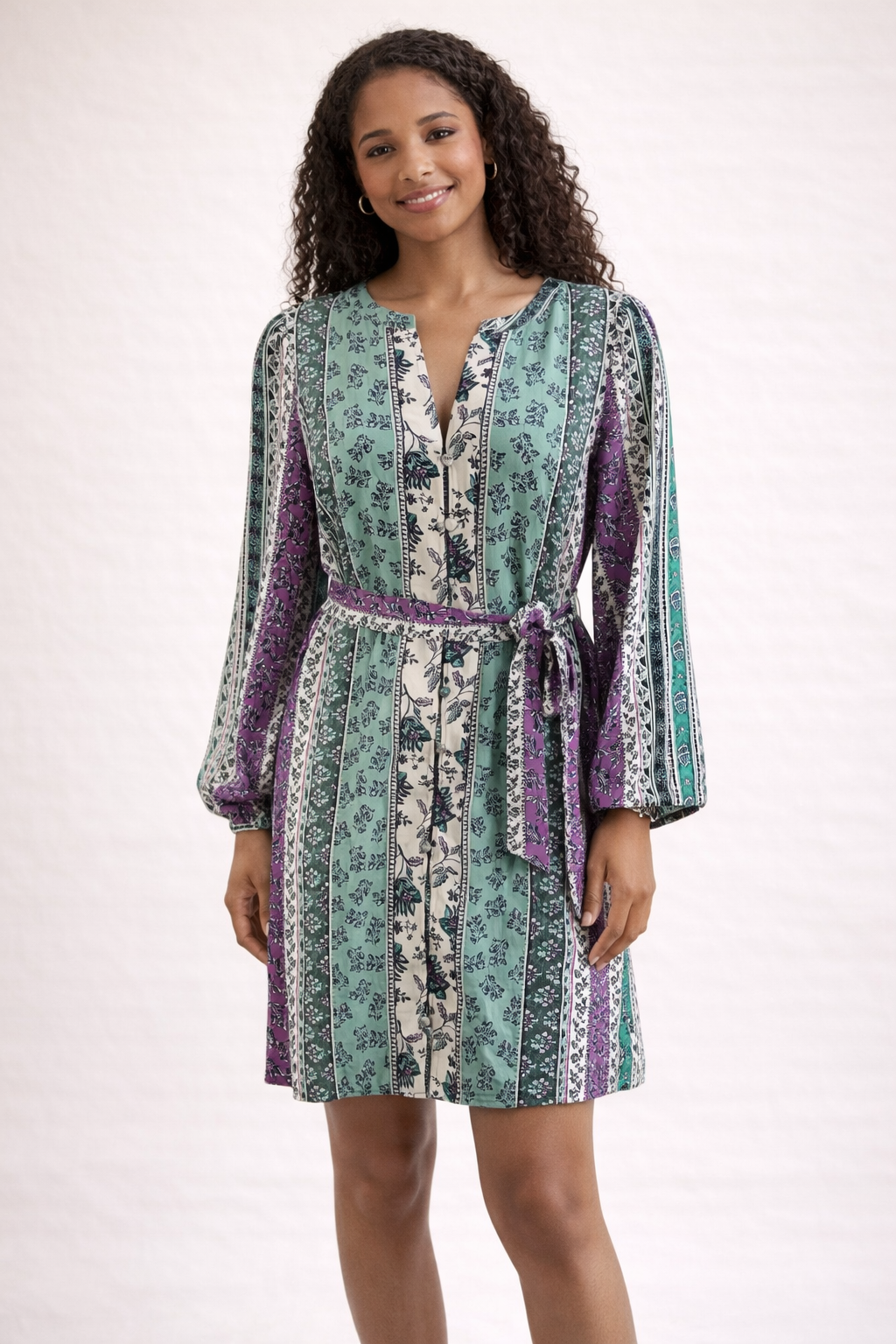 LOFT floral dress in green, purple, and white, A-line style, size 6, showcasing a bohemian peasant design with tags.
