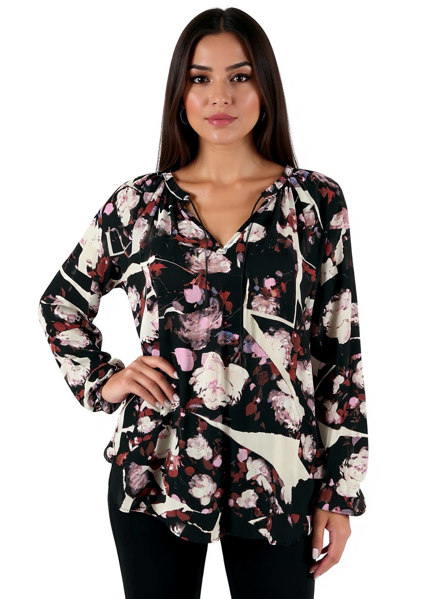 Simply Vera Vera Wang black, white, and rust floral peasant tunic blouse in size medium on a neutral background.