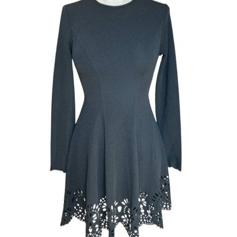 Front view of No Brand Dress Size Small at Margaret's Fine Consignments, black with fitted bodice and floral cutout hem detail.