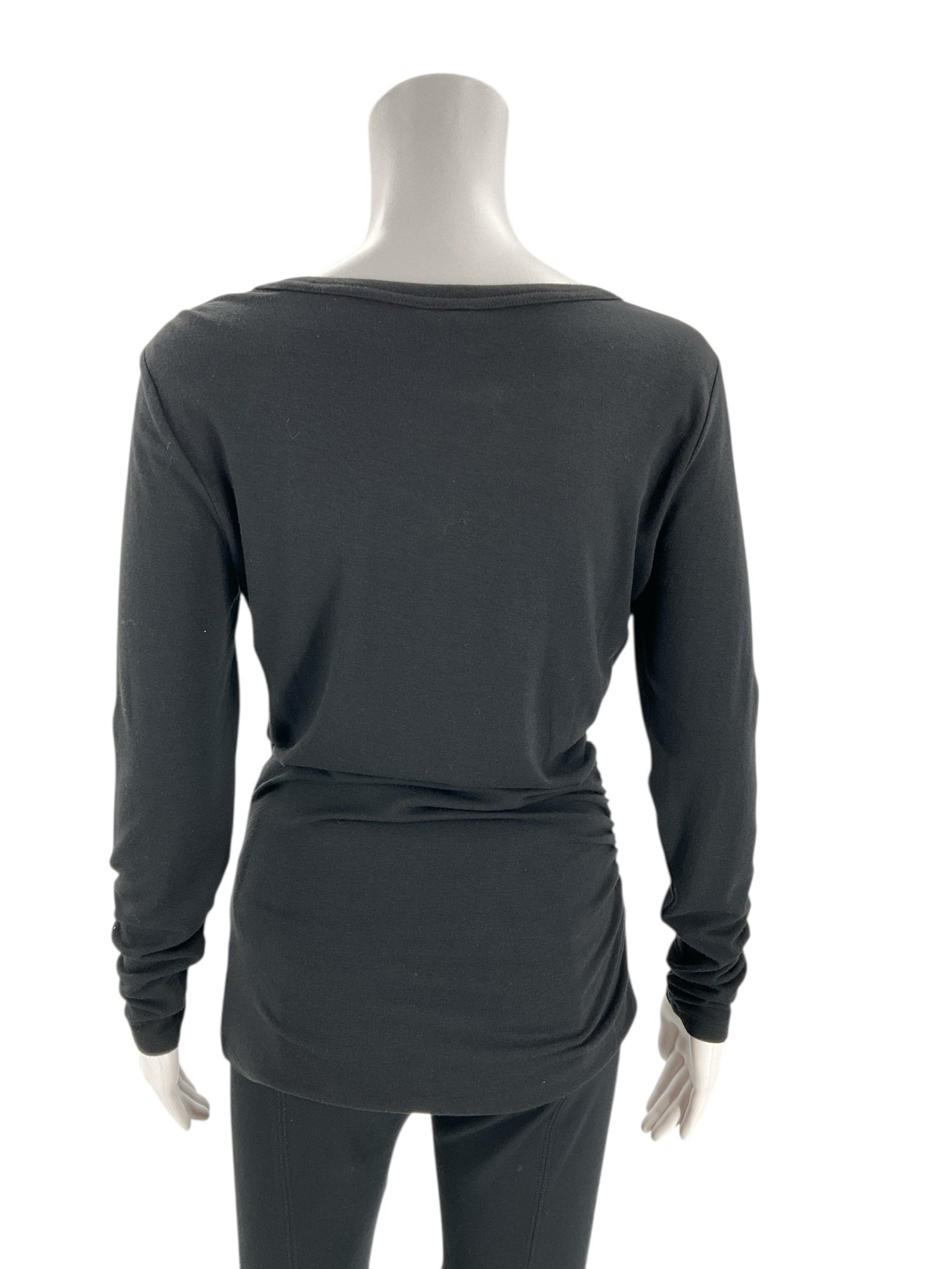 Back view of Ann Taylor Black Solid Pre-Owned Top - Size Small on mannequin, highlighting its smooth finish and classic cut.