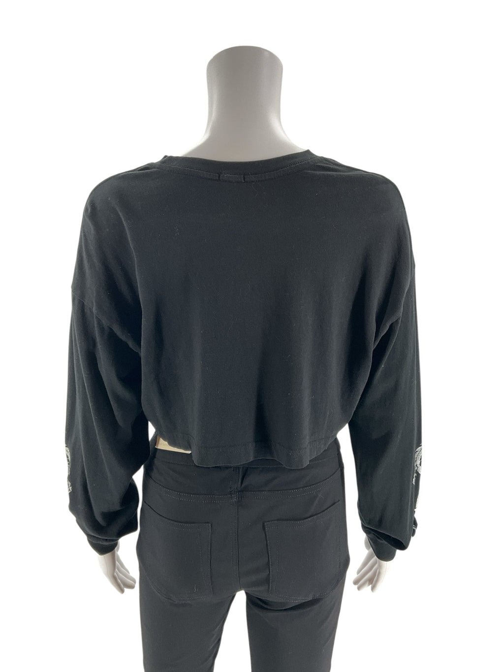 Cropped long sleeve graphic tee in black, featuring edgy design, by Garage, size XS for ladies, Y2K streetwear style.