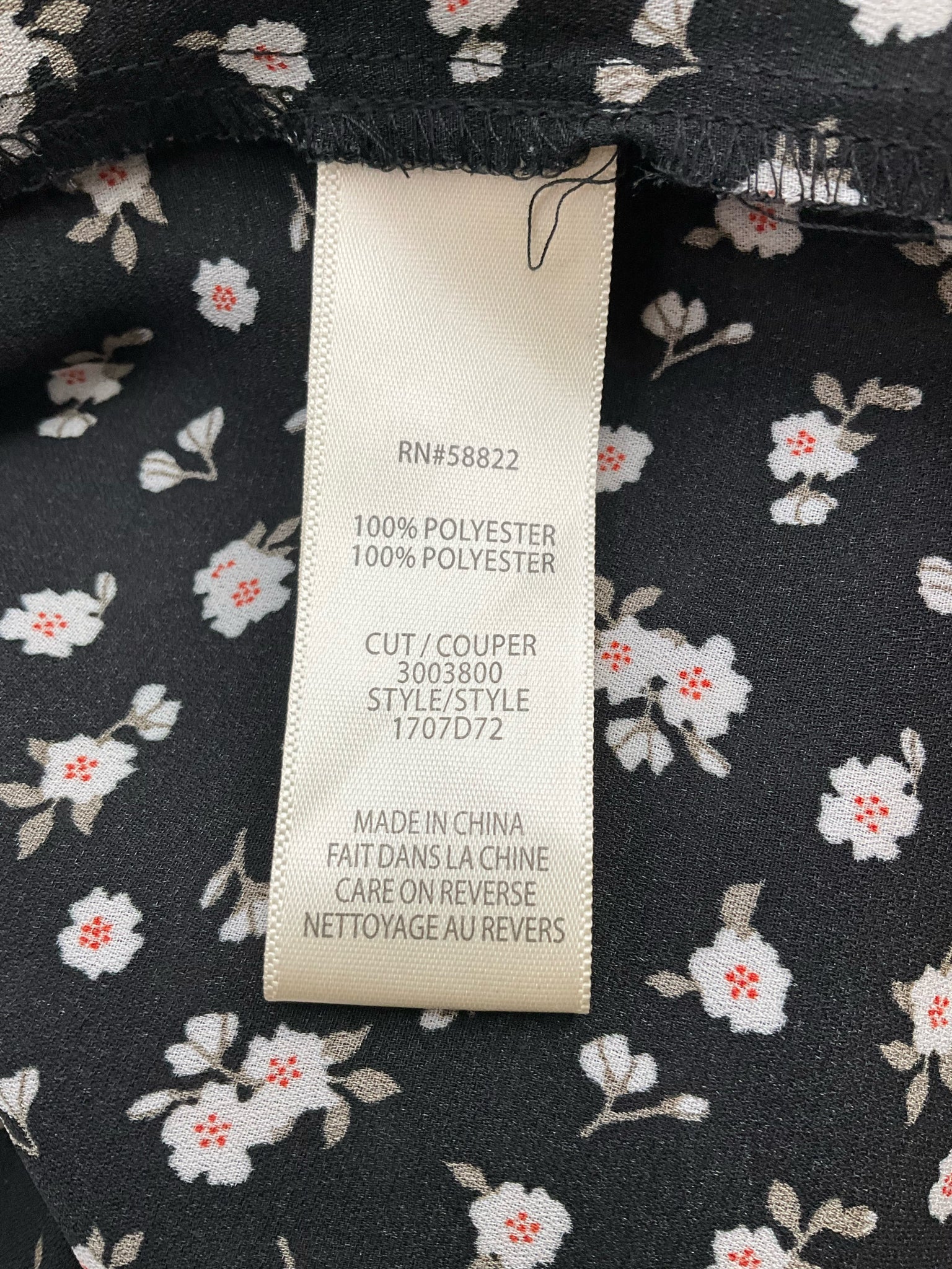 Max Studio white and black floral peasant top, size large, featuring a boho tunic design with romantic details.