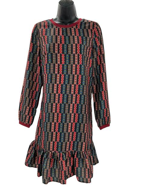 Gently used Joy Joy Dress Size Small featuring black and rust block print and ruffle hem, showcased on black mannequin for resale.