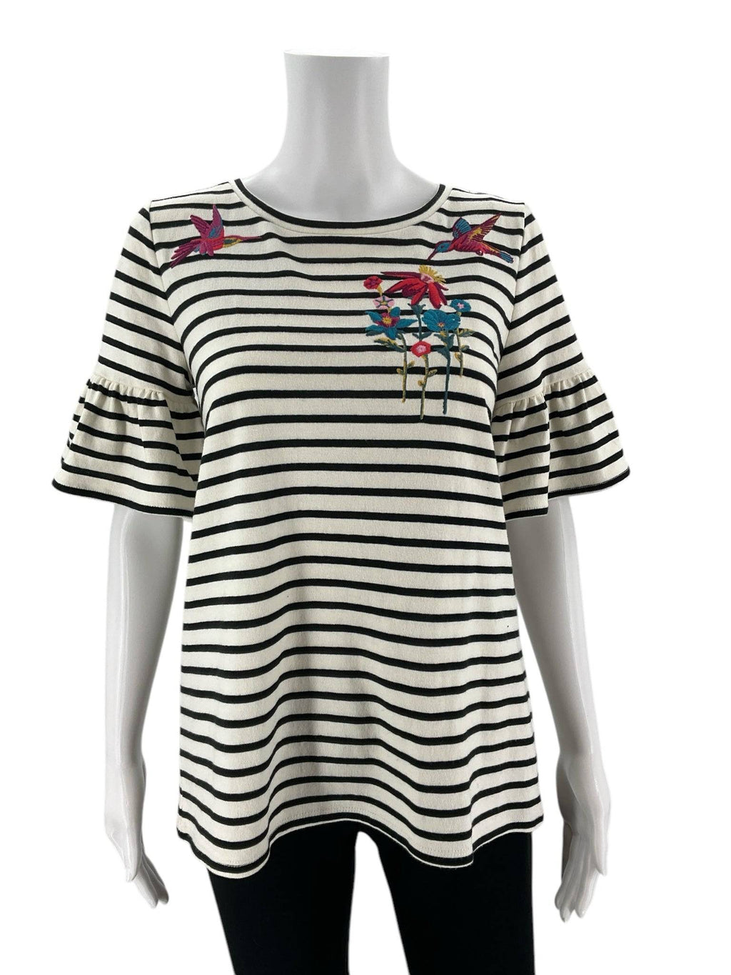 Front view of Loft Top Size Small at Margaret’s Fine Consignments. Cream/navy striped casual top with floral embroidery and ruffled sleeves.