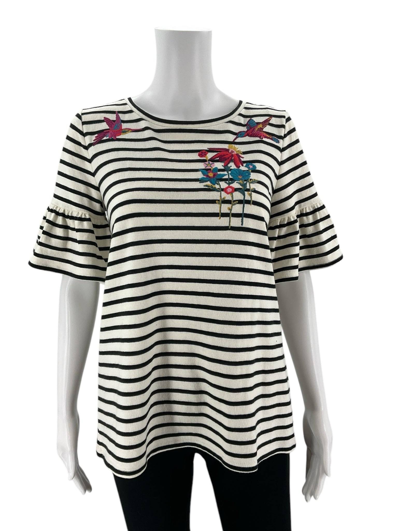 Front view of Loft Top Size Small at Margaret’s Fine Consignments. Cream/navy striped casual top with floral embroidery and ruffled sleeves.