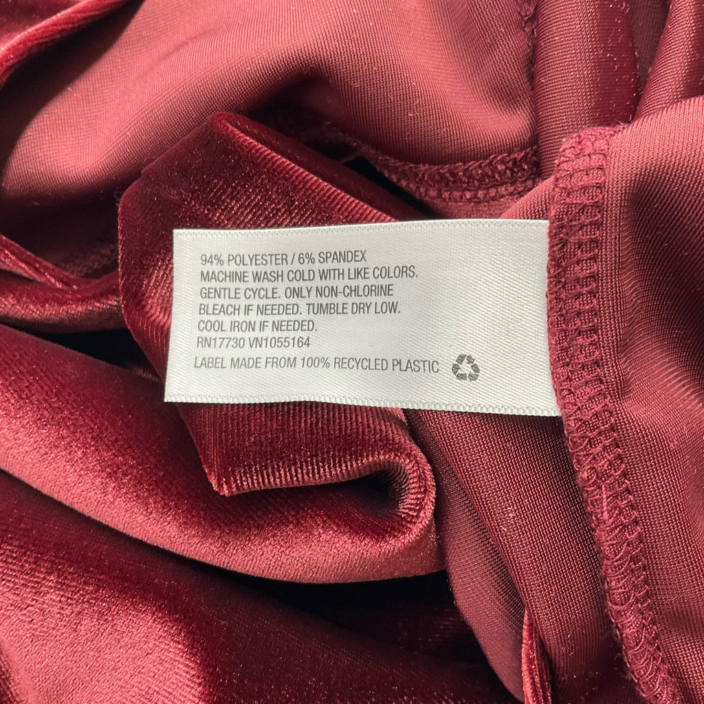 Fabric care label of A New Day Burgundy Pre-Owned Dress - Size XL showing recycled materials and wash instructions for eco-conscious buyers.