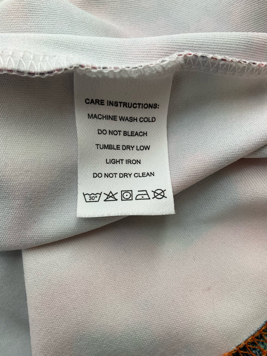 Exclusive abstract casual top for ladies in size XL, featuring a unique design and relaxed fit.