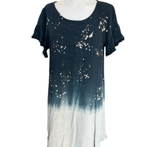 Front view of Umgee black and tan splatter dress, size small, with ruffled sleeves and ombré hem, sold at Margaret's Fine Consignments.