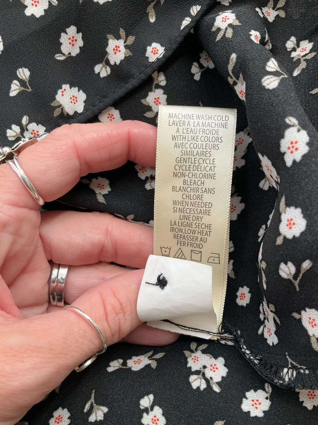 Max Studio white and black floral peasant top in size large with a boho, romantic tunic style and flowy sleeves.