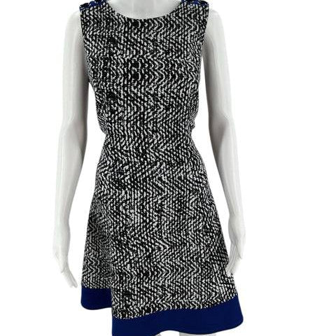 Alyx White/Black Print Dress Size 16P displayed on mannequin with geometric print and blue trim, shop at Margaret’s Fine Consignments.