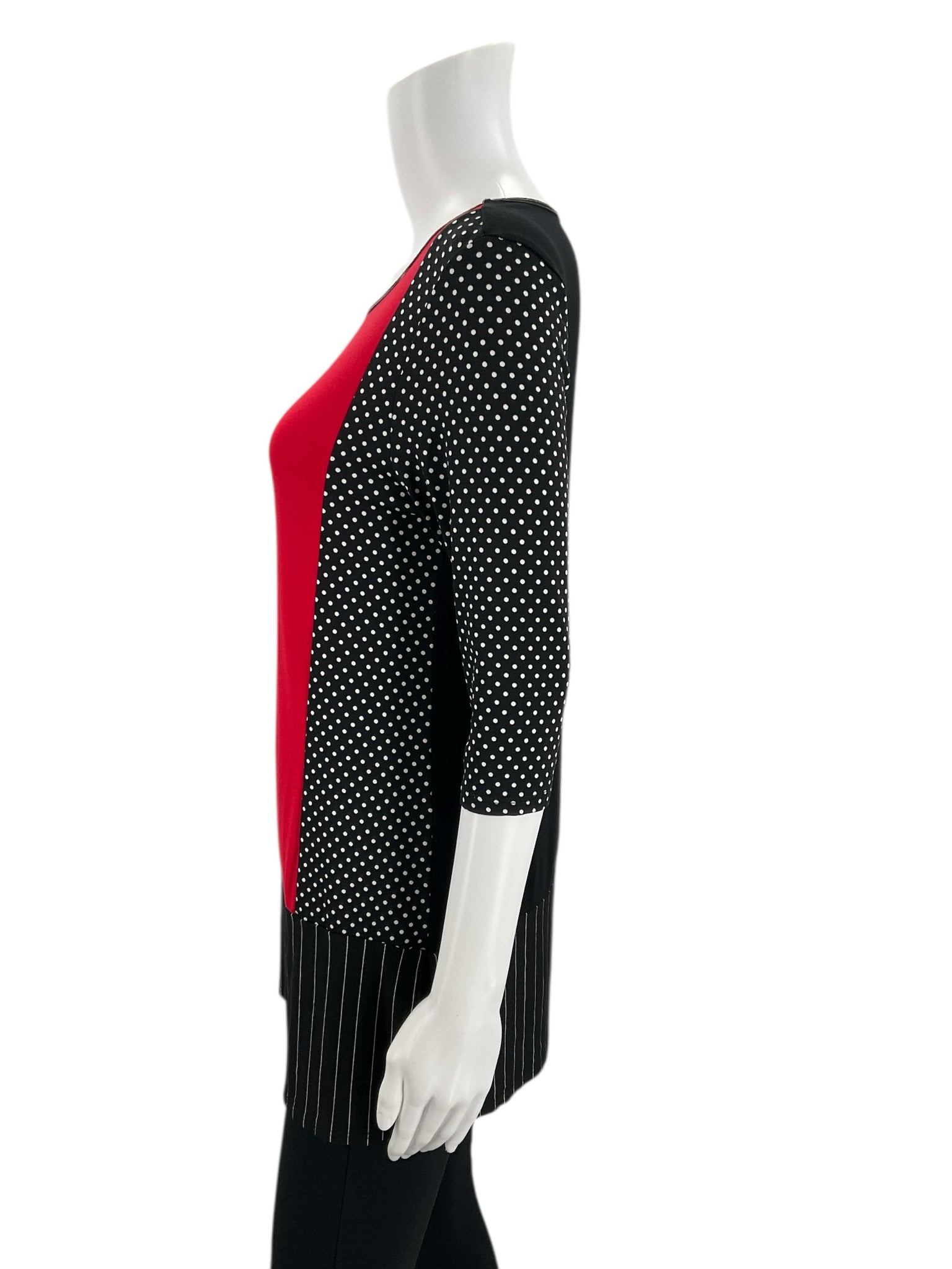 Side profile of Cielo Blu red/black top, size small, showing mixed patterns and flattering silhouette in a pre-owned women's blouse.