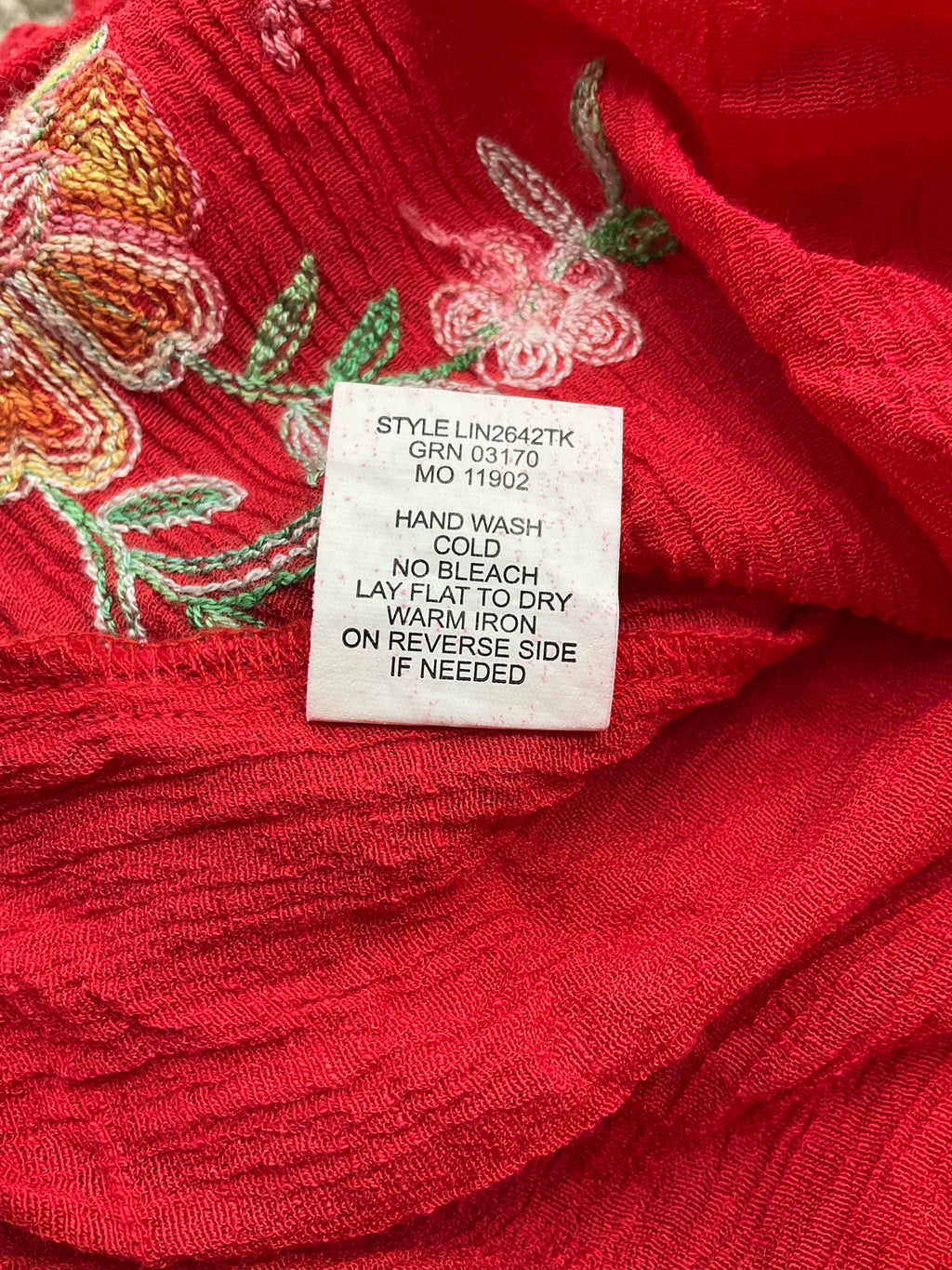 Red and multi-colored embroidered Fig & Flower ladies' top, size small, featuring a bohemian peasant style.