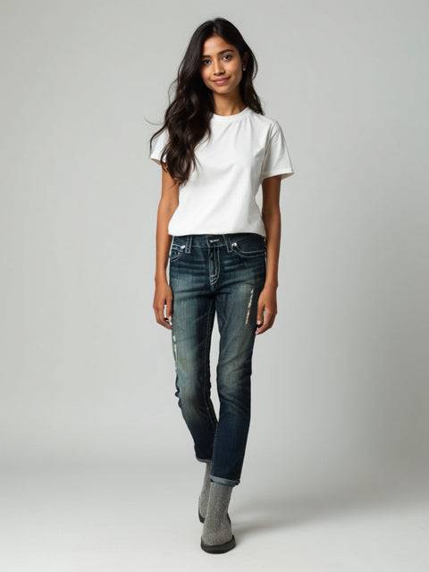 Model wearing D9 Dark Jeans - Distressed Bootcut Vintage Size 7, gently used denim with faded front and rolled cuffs.