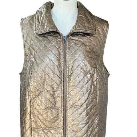 Chico's gold quilted vest in Size XL displayed on mannequin, featuring front zipper and metallic sheen for a stylish outerwear look.