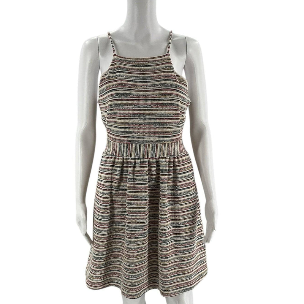 Front view of Banana Republic Sleeveless Knit Dress Size 8 Petite in cream/multi, featuring a high neckline and gathered waist, available at Margaret's Fine Consignments.