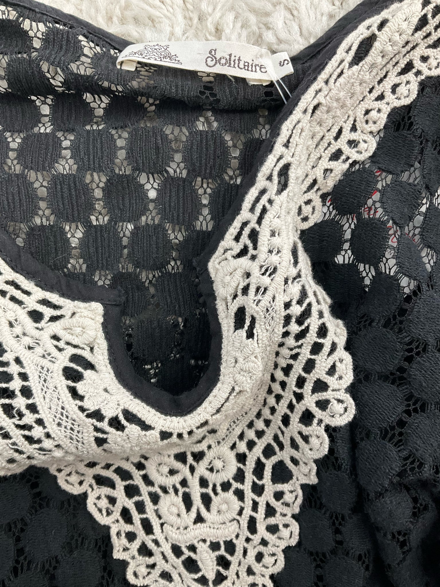 Pre-owned Solitaire black lace ladies top, size small, featuring a bohemian style perfect for casual or festival wear.