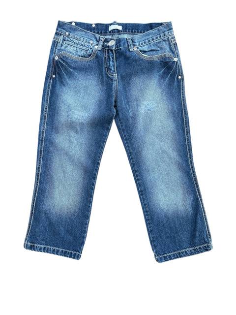 Flat lay of PINKO Capri Jeans Size 6 with faded wash and front pocket detailing, available at Margaret's Fine Consignments.