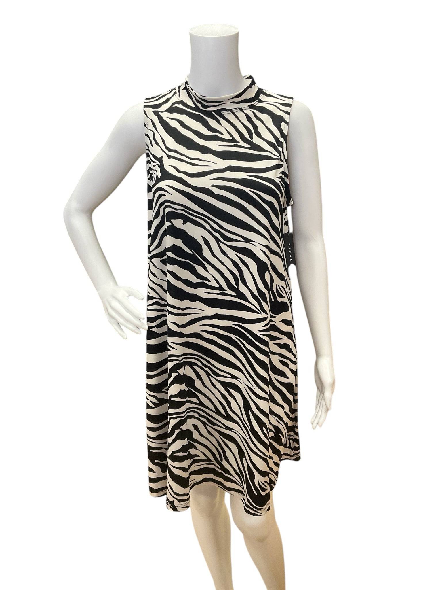 Front view of Tiana B. zebra print sleeveless dress in size medium, displayed on mannequin at Margaret’s Fine Consignments.