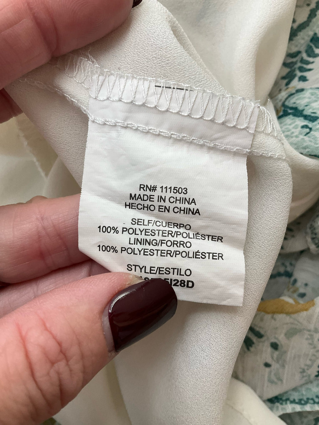 Lily Star teal and tan floral sleeveless tunic blouse with a high neck and tiered design, size large.