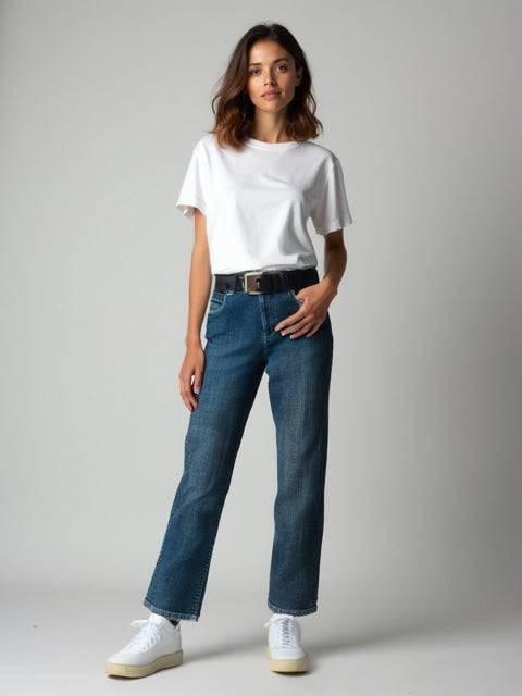 Model wearing Chico's Jeans Size 0 styled with a white tee and sneakers, available at Margaret’s Fine Consignments for timeless casual fashion.