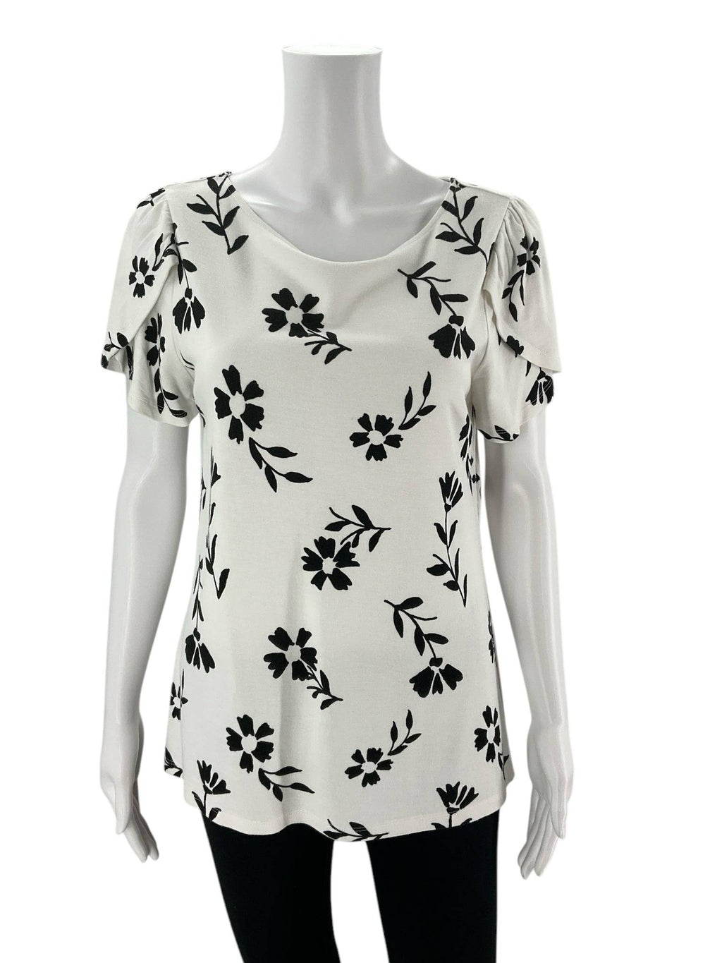 Front view of Ann Taylor Top Size Medium | Margaret’s Fine Consignments featuring white fabric with black floral print and flutter sleeves.
