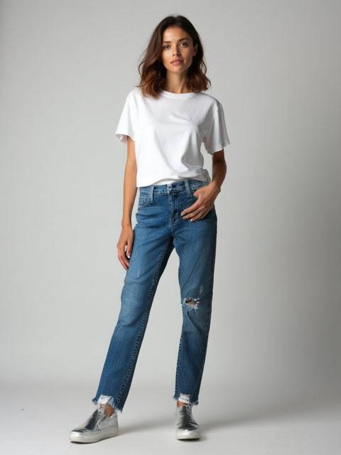 Model wearing Hudson Jeans Size 4 - Distressed Denim, styled with a white tee and sneakers, showcasing a casual pre-owned look.