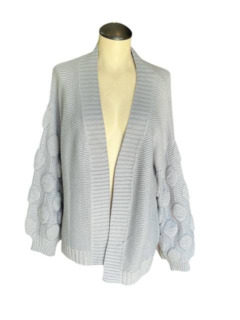No Brand Shrug Size Medium in gray with cable knit sleeves, available at Margaret’s Fine Consignments. Cozy outerwear ideal for layering.
