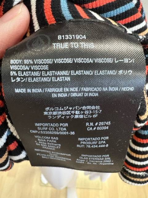 Close-up of fabric tag on Volcom Dress Size Small showing 95% viscose and 5% elastane composition, confirming quality at Margaret’s Fine Consignments.