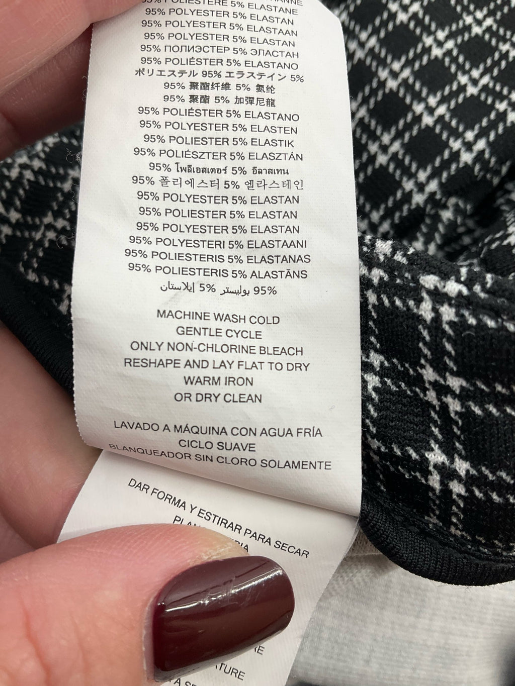 Michael Kors black and white plaid pre-owned pull-on ankle trousers in slim fit, size medium, displayed on a neutral background.