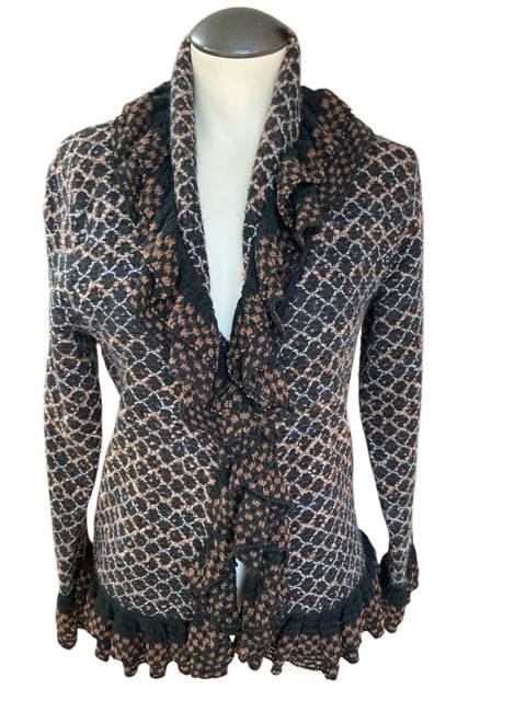 Front view of Yvos Brown/Black Ruffle Shrug Size Small with textured knit and ruffled edges, sold at Margaret’s Fine Consignments.