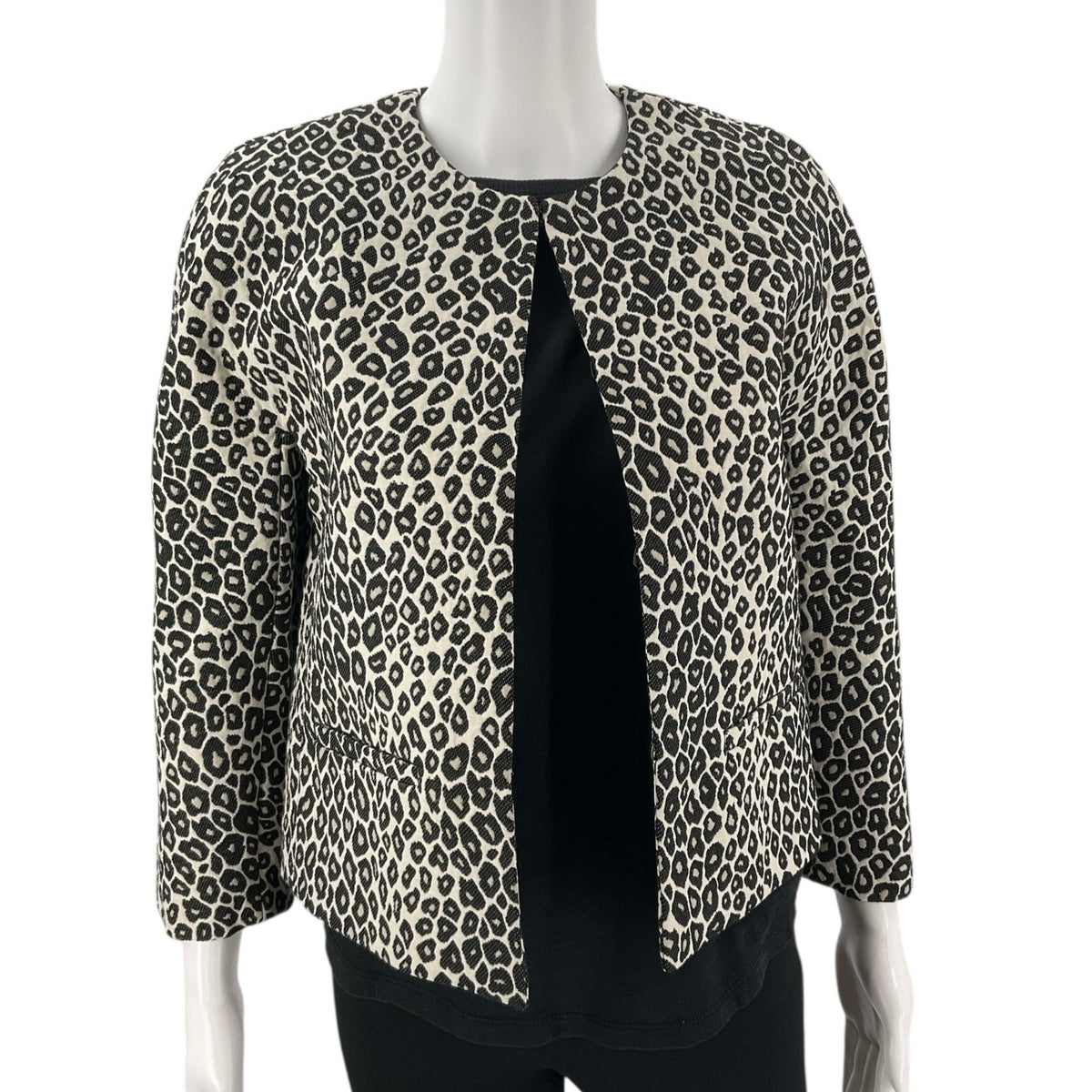 Front view of Ann Taylor Cream/Black Animal Pre-Owned Jacket - Size XS on mannequin, featuring open front and textured leopard pattern.