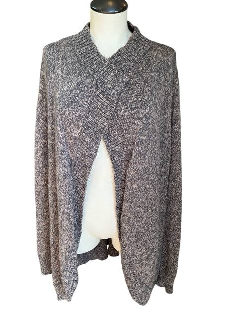 Front view of Cabi Shrug Size XL in brown knit, featuring a relaxed fit and ribbed collar. Shop this stylish outerwear at Margaret’s Fine Consignments.