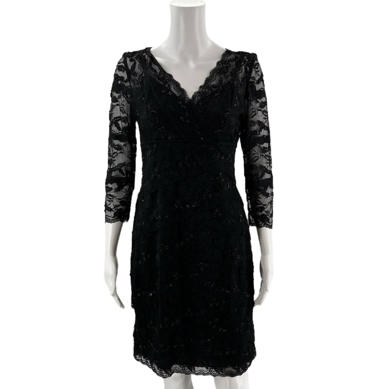 Front view of Marina Dress Size 10 Petite in black lace with V-neck and 3/4 sleeves, pre-owned at Margaret's Fine Consignments.