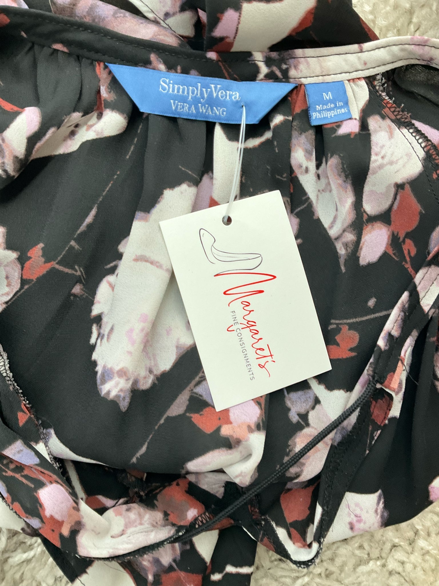 Simply Vera Vera Wang medium peasant top featuring a black, white, and rust floral pattern with a bohemian tunic style.