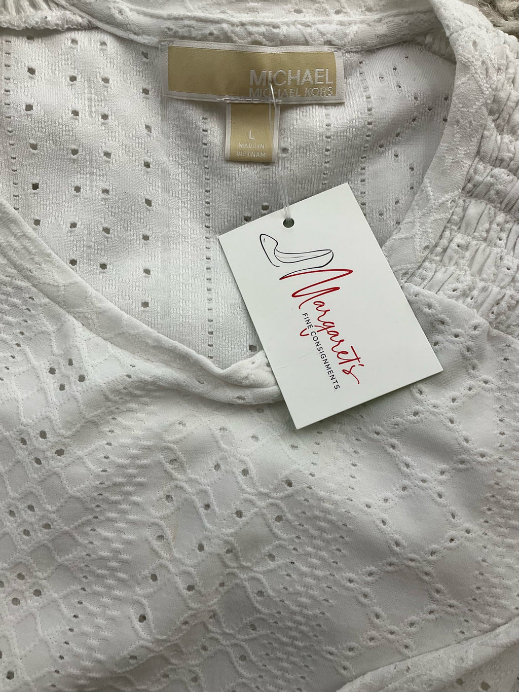 Michael Kors white solid peplum top, sleeveless design, size large, featuring a boho romantic style.