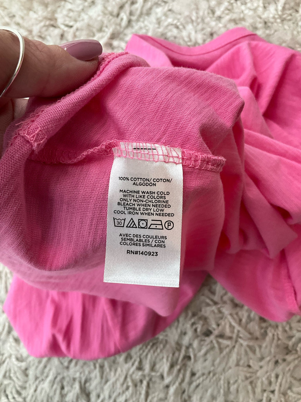 LOFT pink solid pre-owned ladies' t-shirt, casual top, size small, displayed on a mannequin against a neutral background.