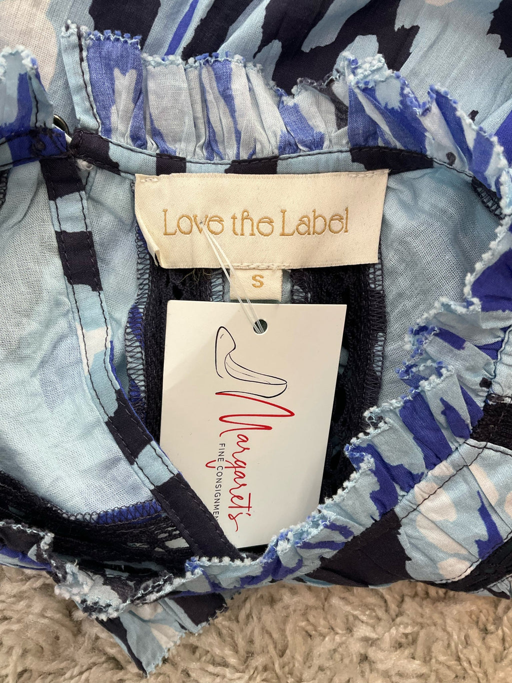 Love The Label blue print pre-owned ladies top in size small with romantic statement sleeves and bohemian style.