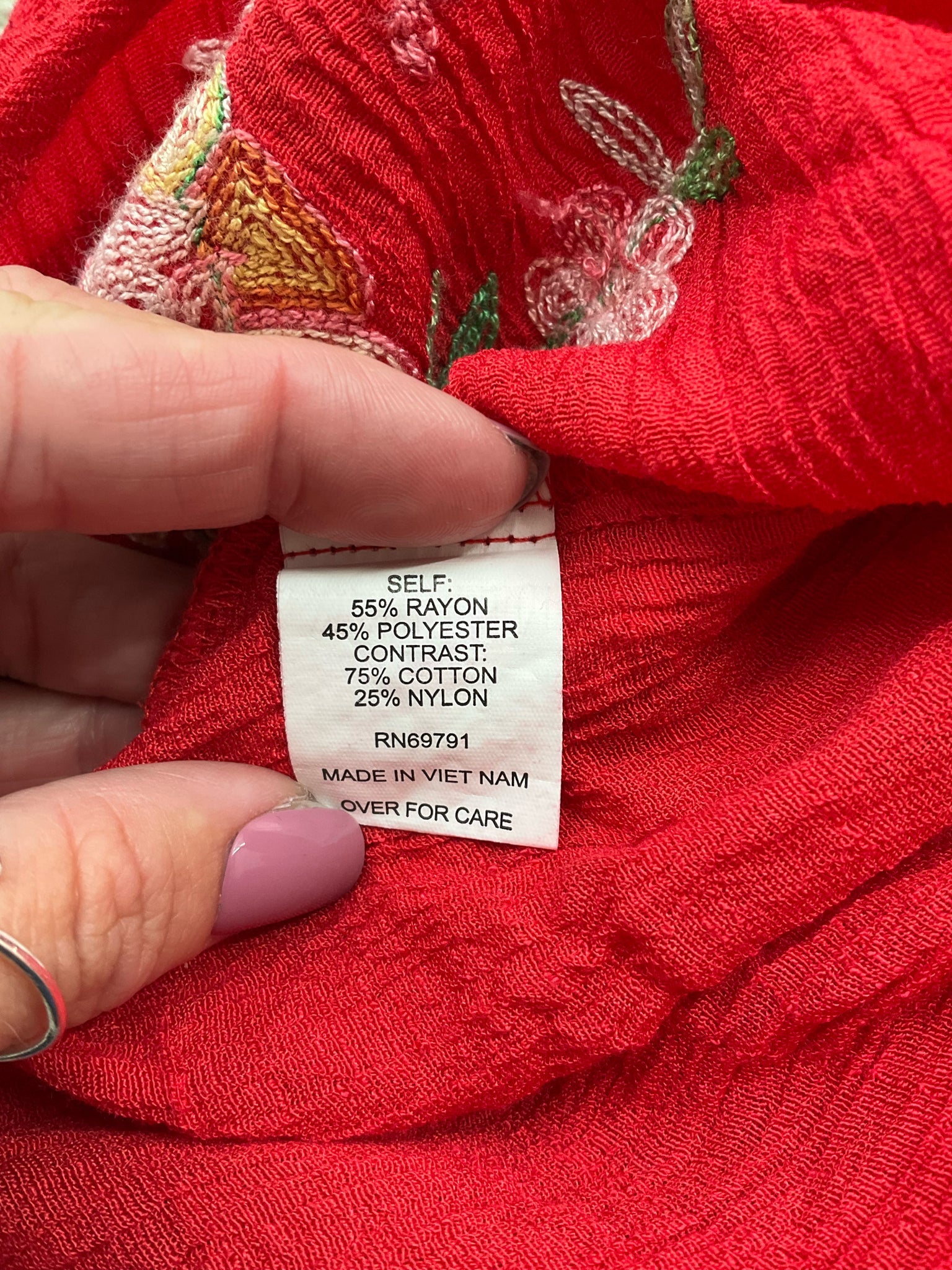 Fig & Flower red and multi embroidered pre-owned ladies top in size small with a bohemian peasant style.