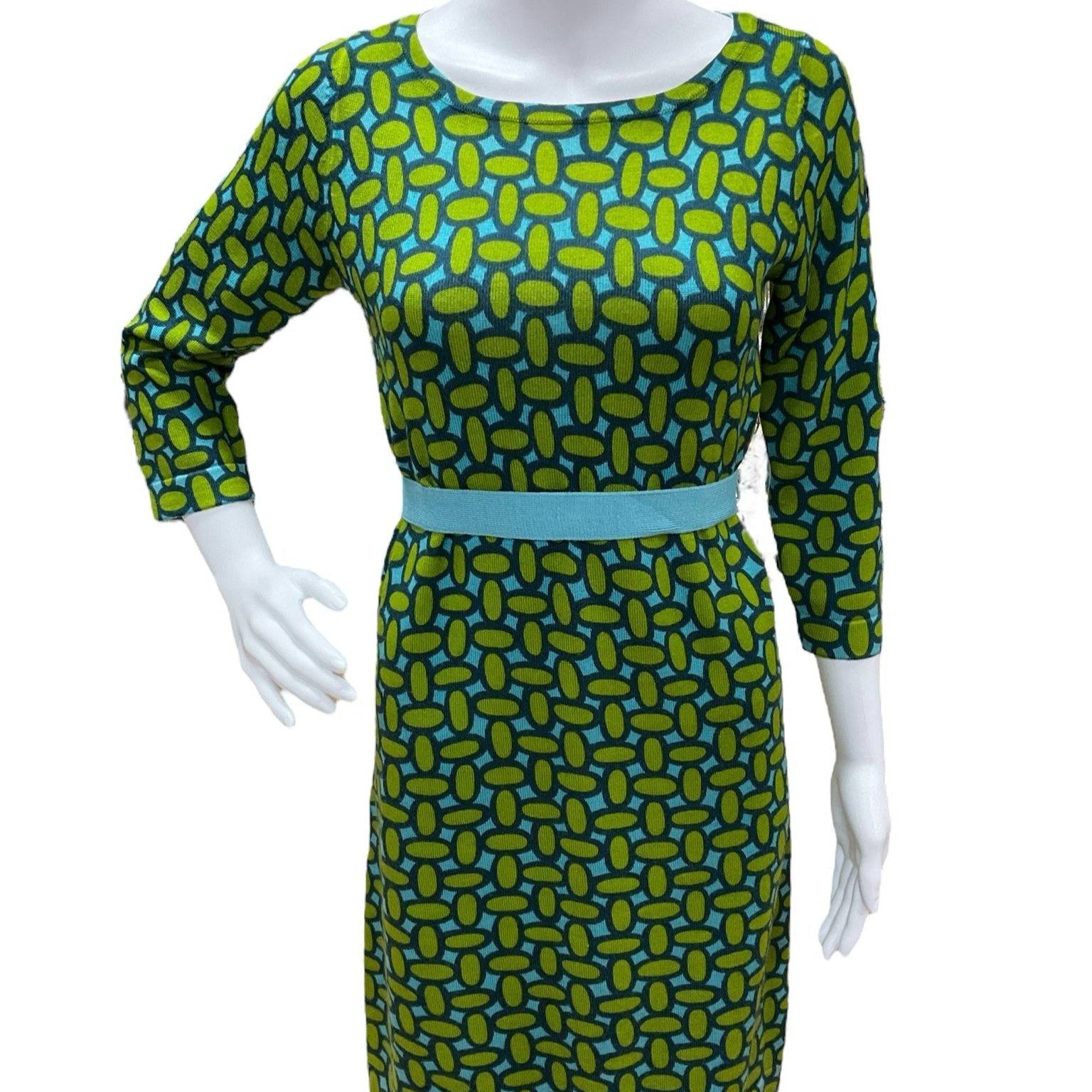 Boden Dress Size 4 featuring green and teal geometric print with light blue waistband, displayed on mannequin at Margaret’s Fine Consignments.