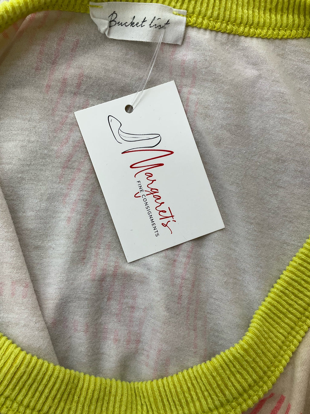 Pre-owned Bucket List ladies' top in tan/pink print, featuring dolman sleeves and a relaxed boat neck design. Size small.