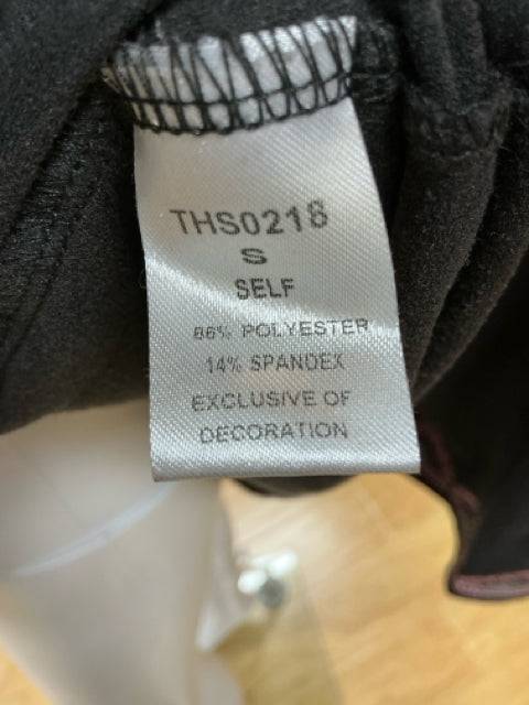 Close-up of THML dress tag showing size Small and fabric composition of 86% polyester and 14% spandex. Shop at Margaret's Consignment.