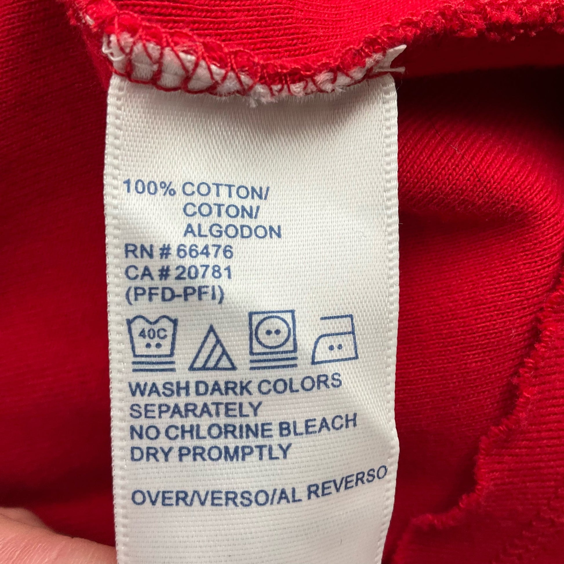 Fabric care label of Tommy Hilfiger Red/Navy Pre-Owned Dress - Size XL, indicating 100% cotton and washing instructions.